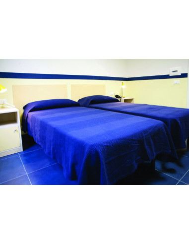 Una camera da letto in Casa AIL